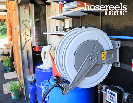 F555 Series steel hose reel being used with air tools