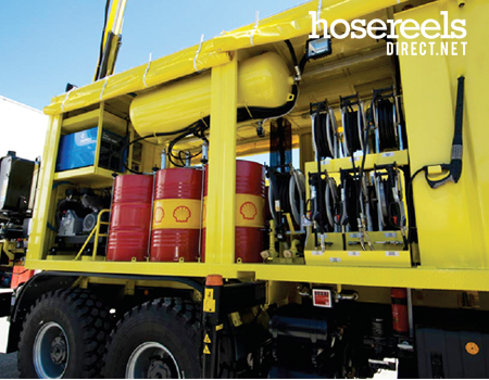 Air hose reel mounted in a recovery truck