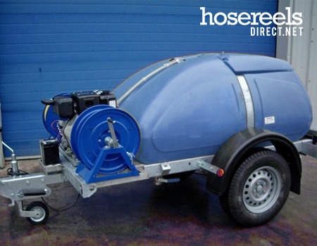 Modified portable power wash trailer with mounted hose reel
