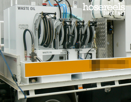 Hose reel being used at a dockside filling station