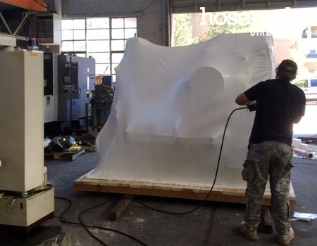 Propane shrink wrapping plant equipment in a workshop