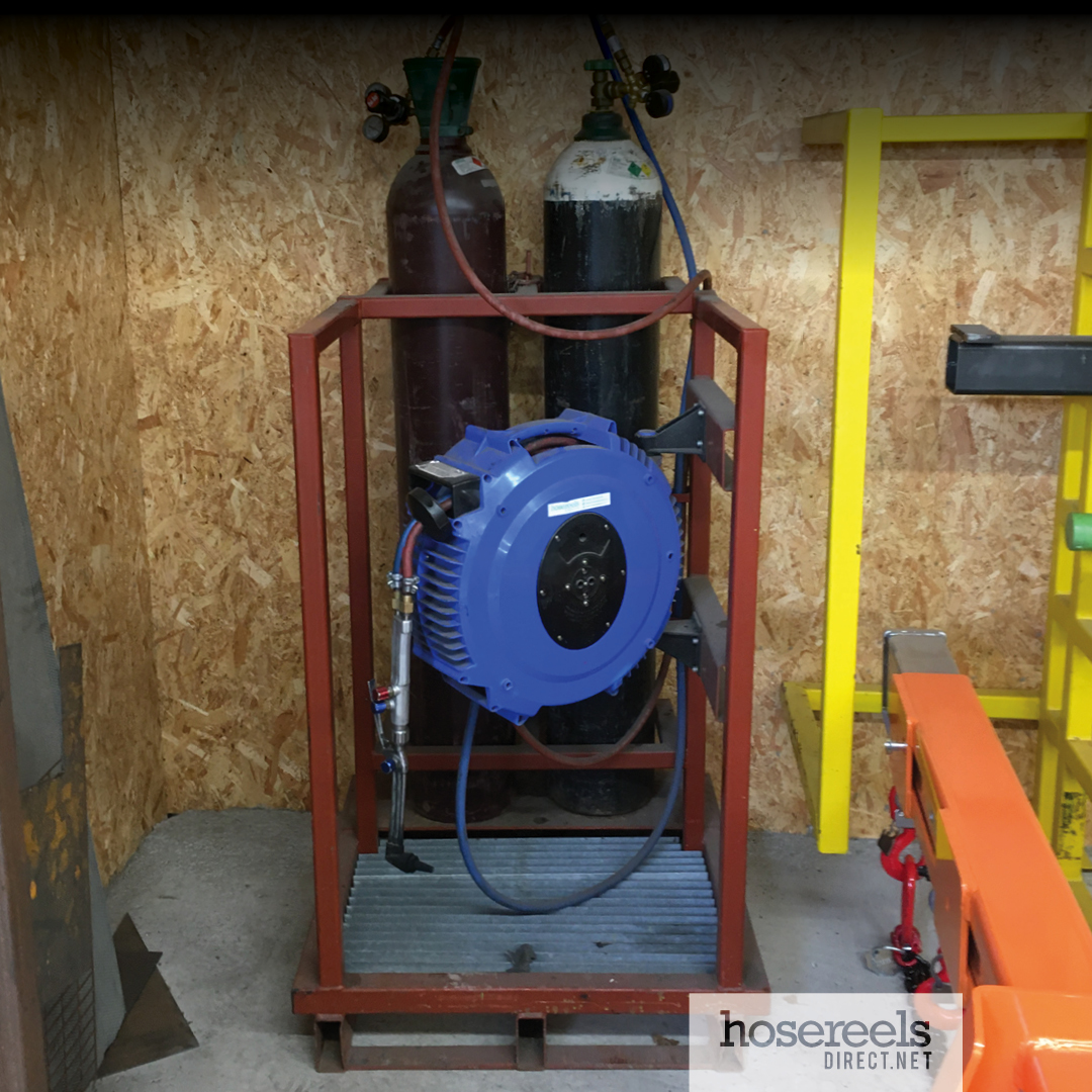 ReCoila Hose Reel being used with a oxy/acetylene gas bottle trolley